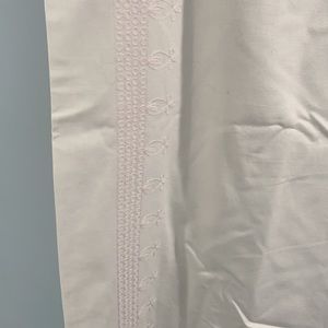 Pottery Barn Kids - pair of white black out curtain with pink trim